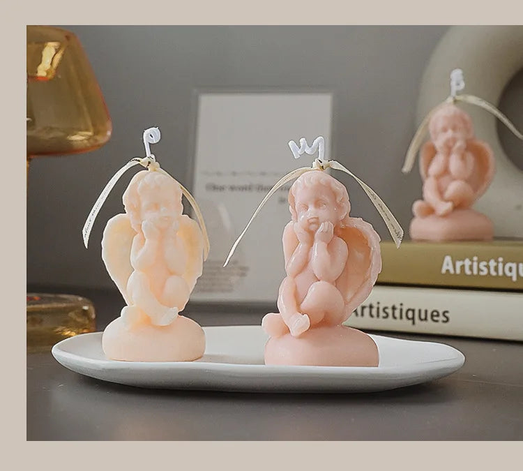 Candela decorativa a forma di angioletto