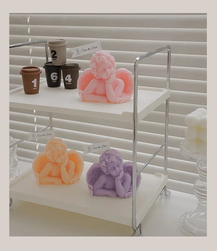 Candela decorativa a forma di angioletto