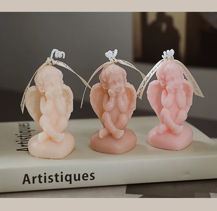 Candela decorativa a forma di angioletto