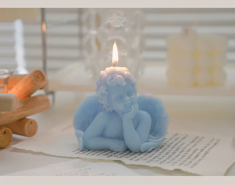 Candela decorativa a forma di angioletto