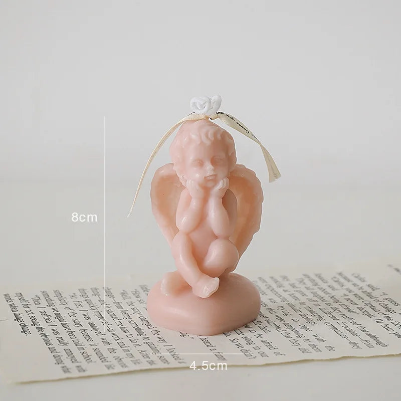 Candela decorativa a forma di angioletto