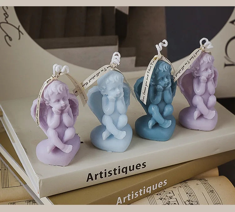 Candela decorativa a forma di angioletto