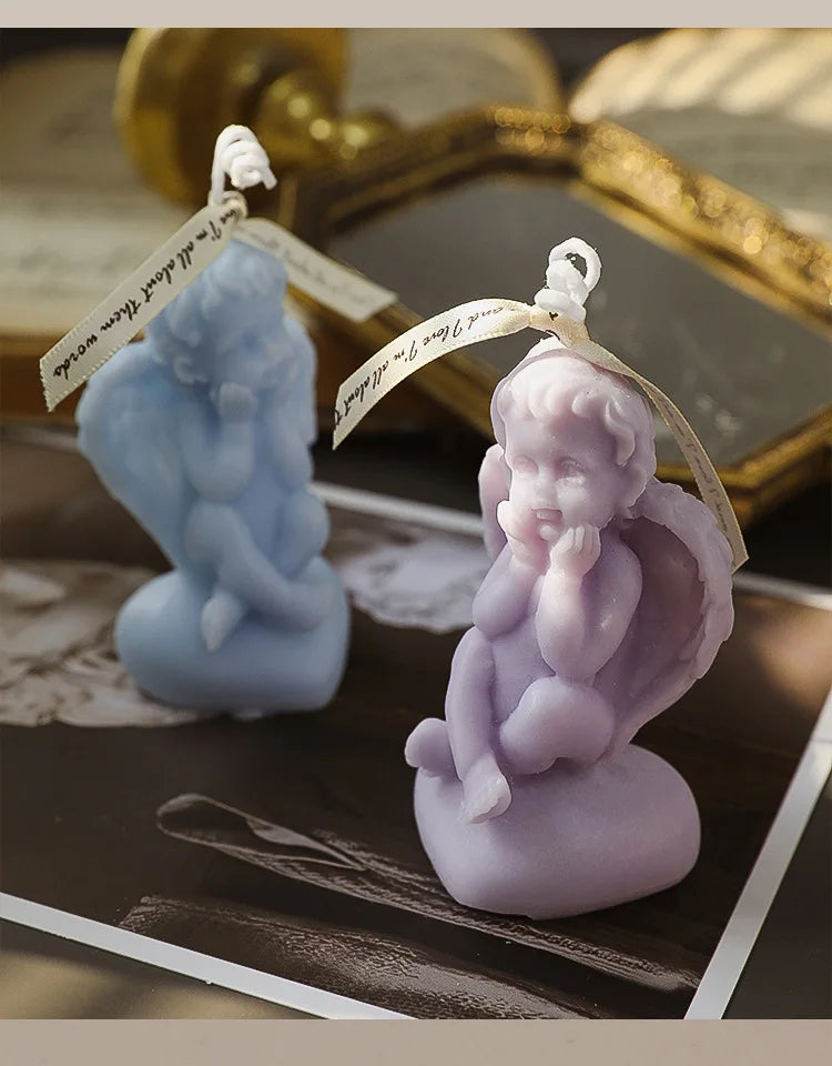 Candela decorativa a forma di angioletto