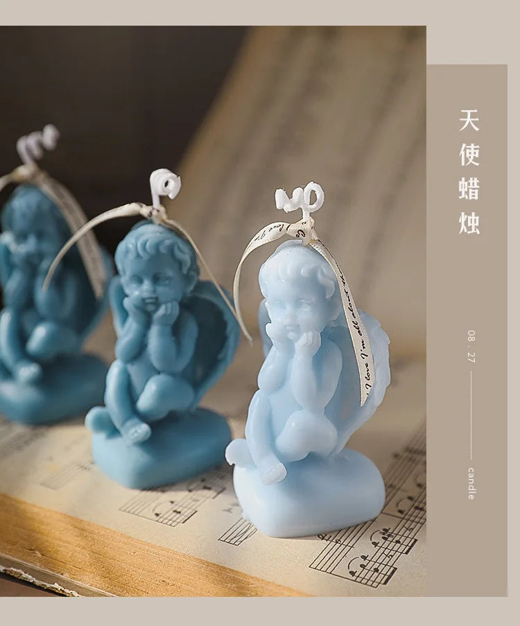 Candela decorativa a forma di angioletto