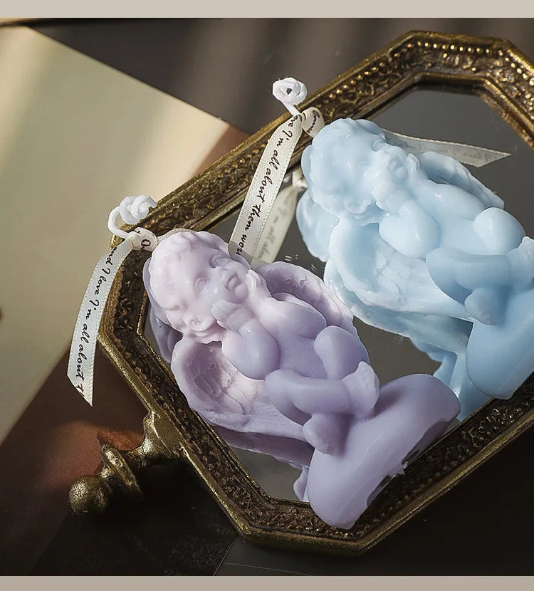 Candela decorativa a forma di angioletto