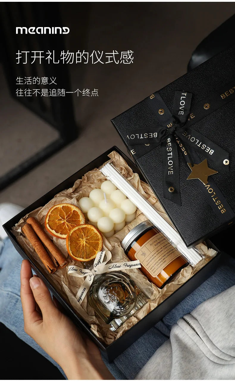Gift box ornamentale con fragranza all'arancia e candele profumate abbinate